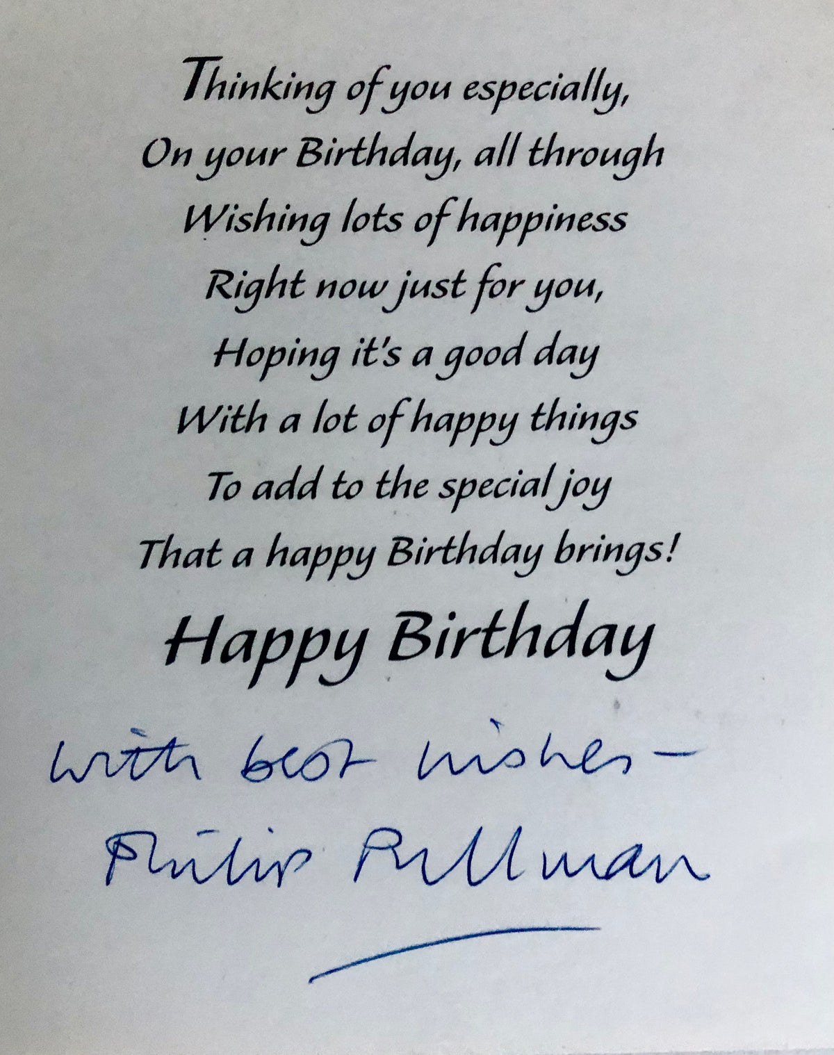 Philip Pullman's inscription and signature on birthday card