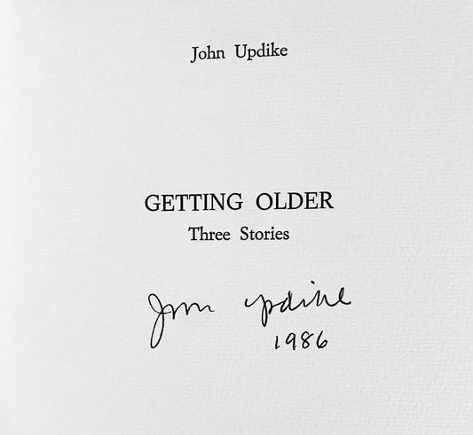 Book cover of 'Getting Older' by John Updike with a signature and year on a light gray background