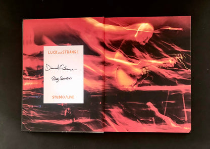 David Gilmour and Polly Samson's autographs on Luck and Strange, First Edition Hardcover.