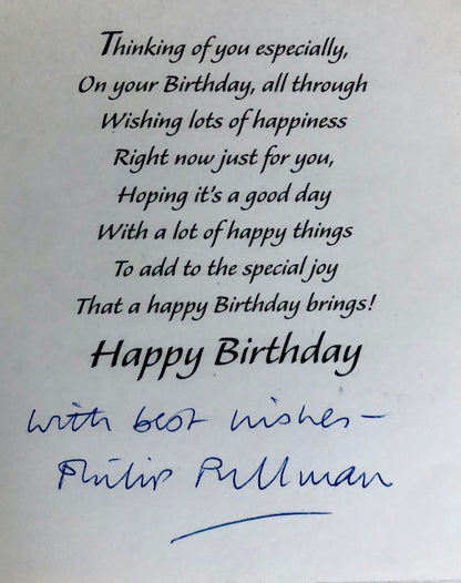 Philip Pullman's inscription and signature on birthday card